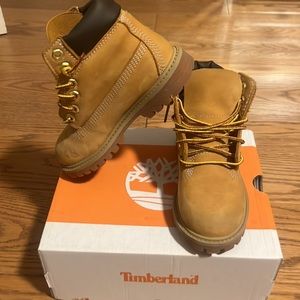 Tan Timberland kids boots, gently used.